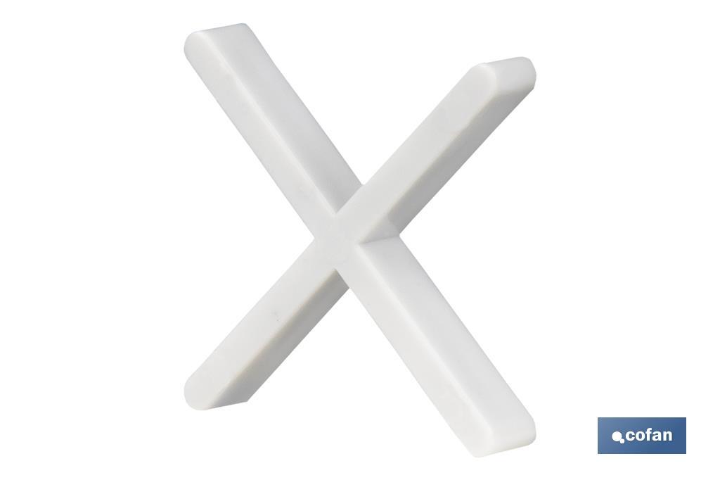 Highly resistant cross-shaped tile spacers for tiling projects | Available in different sizes and packaging - Cofan