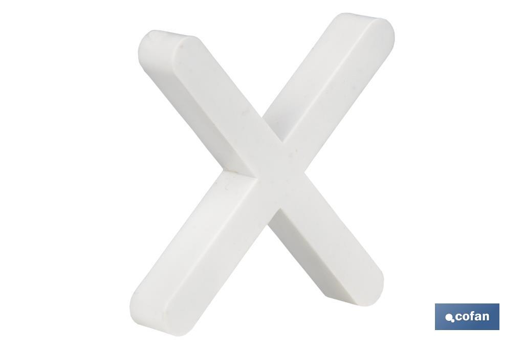 Highly resistant cross-shaped tile spacers for tiling projects | Available in different sizes and packaging - Cofan
