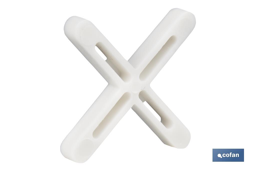 Highly resistant cross-shaped tile spacers for tiling projects | Available in different sizes and packaging - Cofan