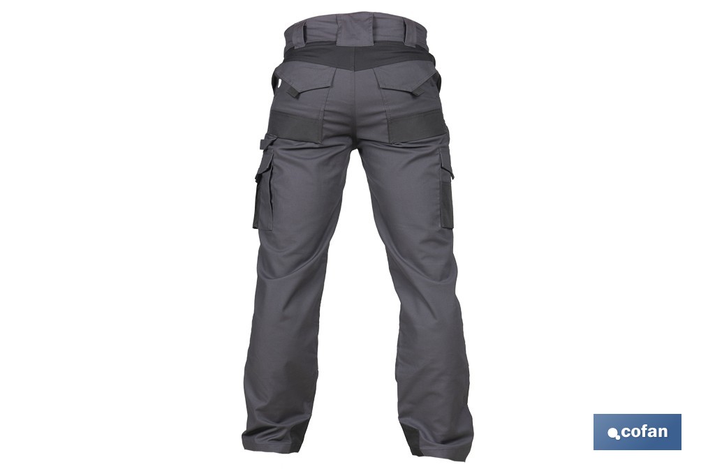 Pantalón de trabajo modelo Heimdall en gris oscuro y negro | Elástico, reforzado con múltiples bolsillos | Materiales: 65 % poliéster, 32 % algodón | Disponible en amplio rango de tallas - Cofan