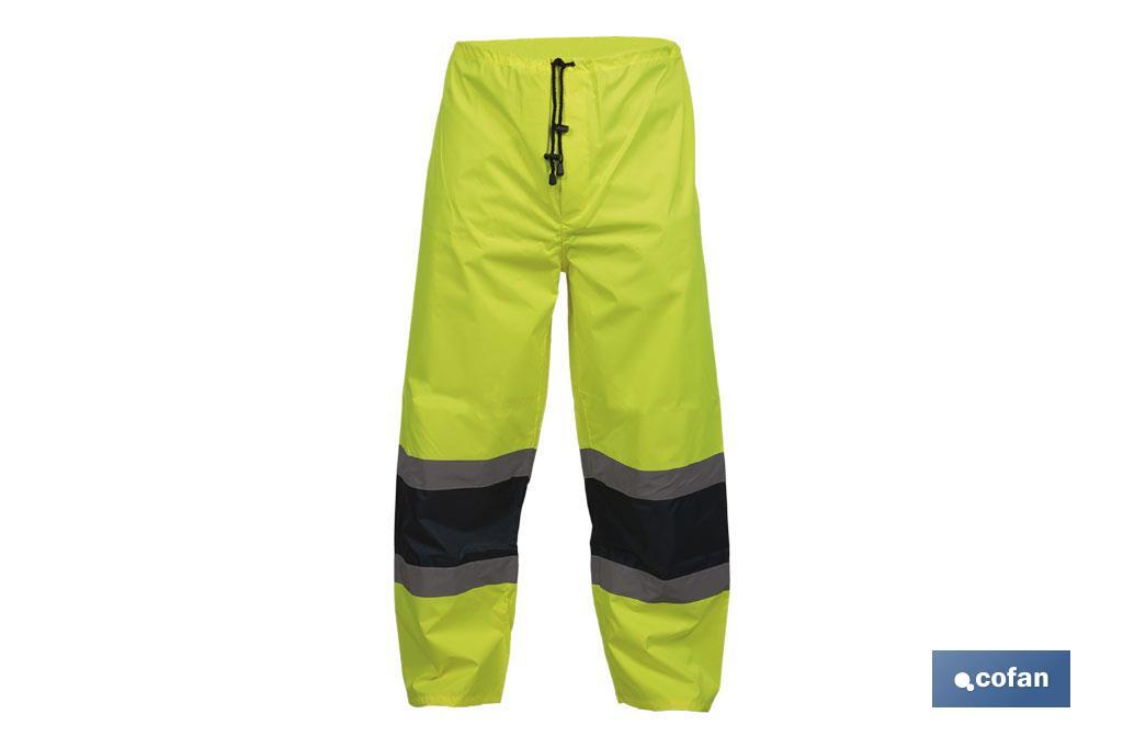 High-visibility waterproof trousers | High-visibility strips | Yellow and blue | Available from size S to XXXL - Cofan