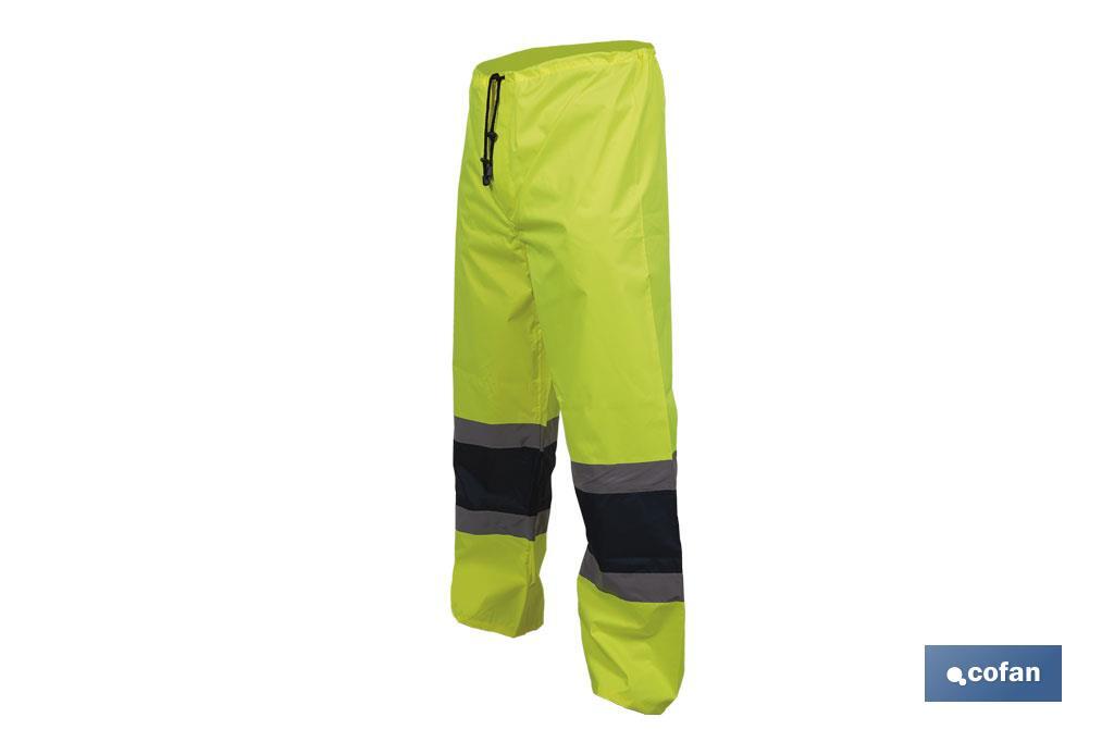 High-visibility waterproof trousers | High-visibility strips | Yellow and blue | Available from size S to XXXL - Cofan