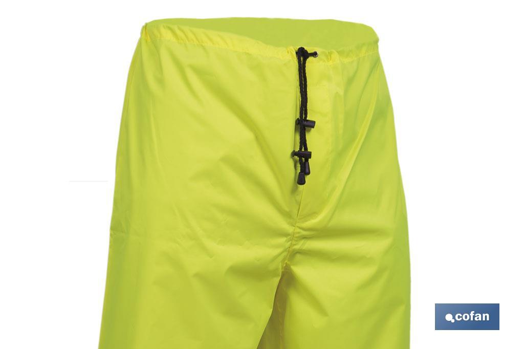 High-visibility waterproof trousers | High-visibility strips | Yellow and blue | Available from size S to XXXL - Cofan
