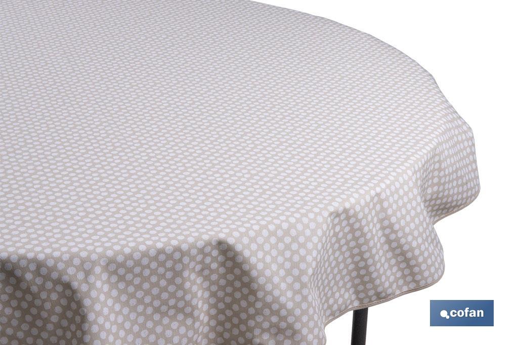 Mantel redondo antimanchas resinado con estampado de topos blancos | Materiales: 50% algodón y 50% poliéster | Diámetro: 1,40 m - Cofan