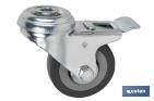 Rueda de goma gris con freno de metal para tornillo pasante | Diámetros desde 50 mm hasta 75 mm | Para pesos desde 36 kg hasta 45 kg - Cofan