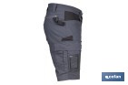 Bermudas de trabajo modelo Frigg en gris y negro | Elásticas, ligeras con múltiples bolsillos y protección lumbar| Materiales: 65 % poliéster y 32 % algodón | Disponibles en amplio rango de tallas - Cofan