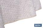 Mantel redondo antimanchas confeccionado en Jacquard con tejido resinado | Diseño de pétalos sobre beige | Materiales: 50% algodón y 50% poliéster | Diferentes medidas - Cofan
