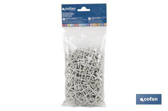 Highly resistant cross-shaped tile spacers for tiling projects | Available in different sizes and packaging - Cofan