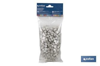 Highly resistant cross-shaped tile spacers for tiling projects | Available in different sizes and packaging - Cofan