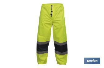 High-visibility waterproof trousers | High-visibility strips | Yellow and blue | Available from size S to XXXL - Cofan