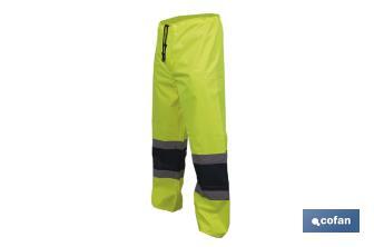 High-visibility waterproof trousers | High-visibility strips | Yellow and blue | Available from size S to XXXL - Cofan