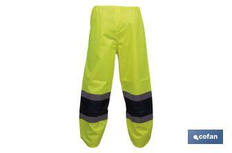 High-visibility waterproof trousers | High-visibility strips | Yellow and blue | Available from size S to XXXL - Cofan