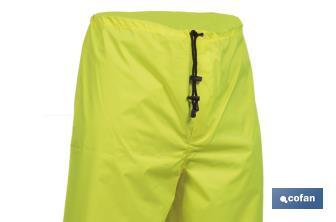 High-visibility waterproof trousers | High-visibility strips | Yellow and blue | Available from size S to XXXL - Cofan